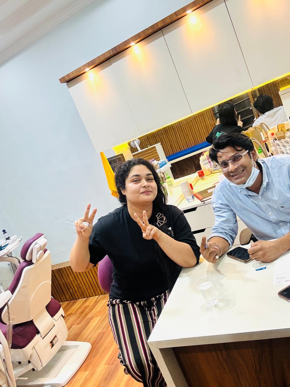 Patient and dentist inside Dental Remedy clinic