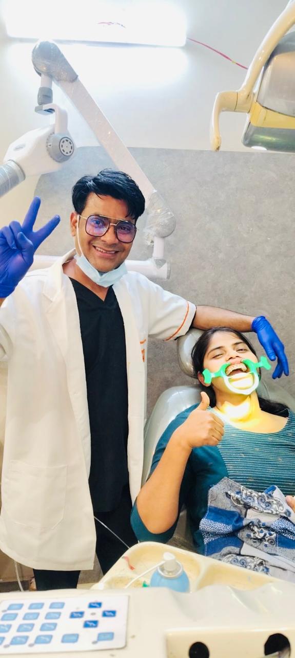 Dental Remedy treatment chair with dentist and patient